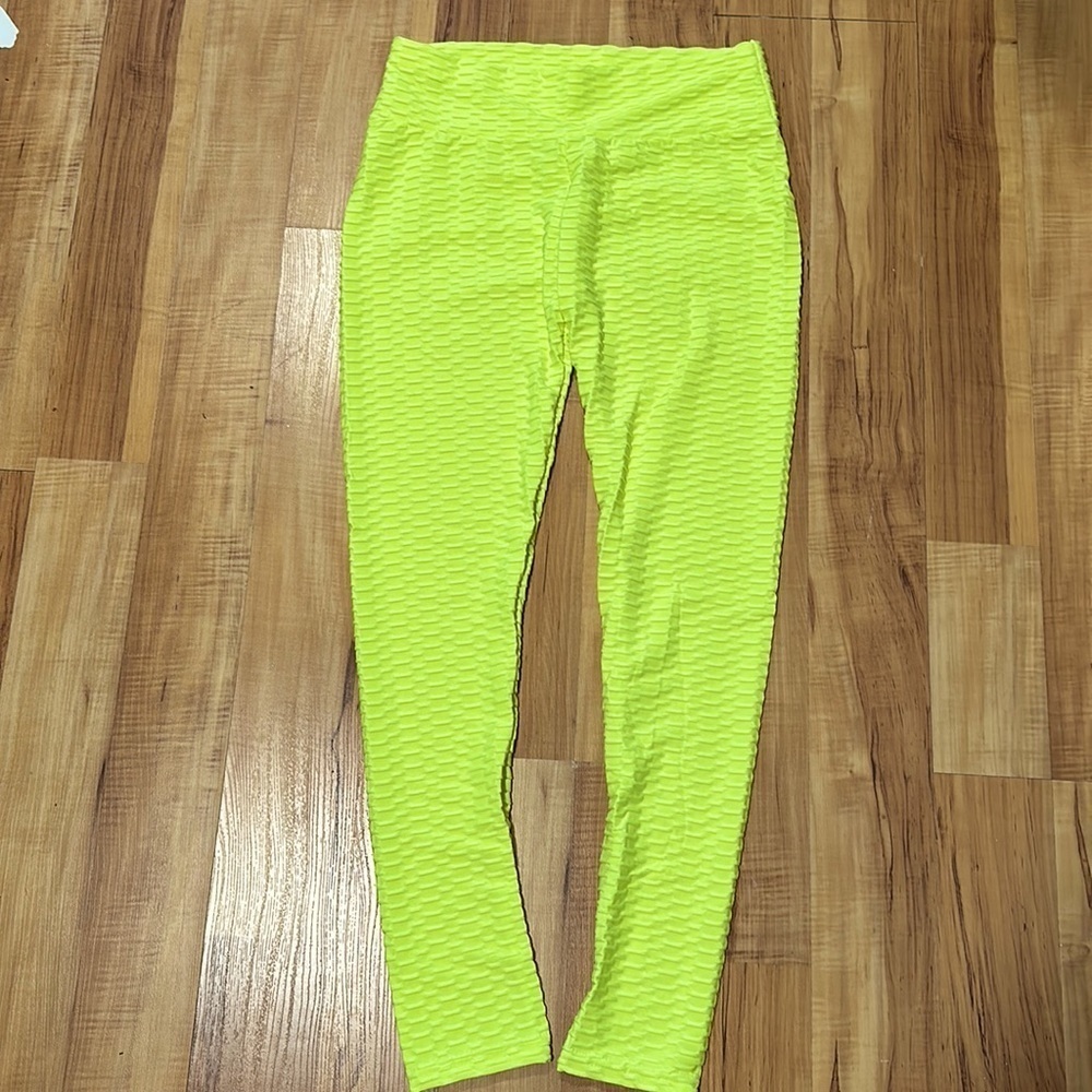 Fluorescent, yellow size extra large, workout pants, textured
